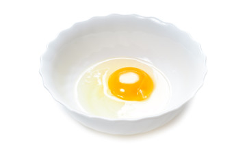Broken egg in bowl