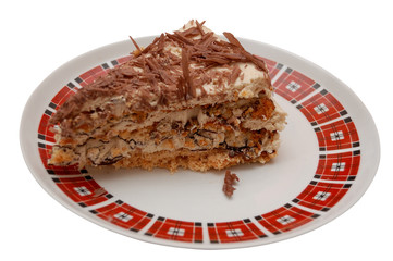 slice of cake on a plate isolated on white