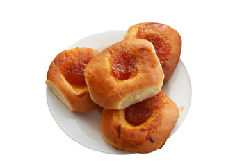 four buns filled with jam isolated on white