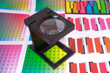 Magnifying glass on color guide and swatch