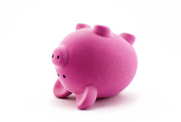 Pink piggy bank upside down