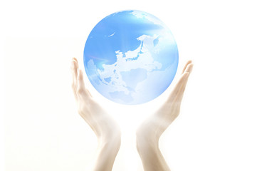手と地球儀