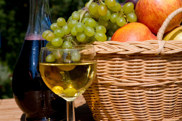 Glass of white wine with  fruits