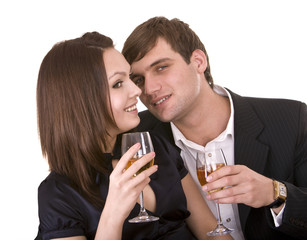 Couple of girl and man kiss and drink wine.