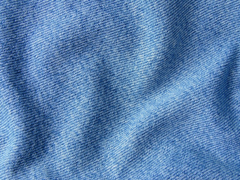 folded blue denim background
