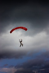 red parachute in the sky