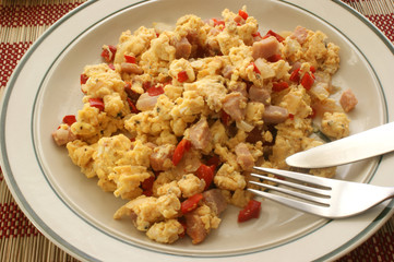 scrambled eggs with organic tomato and bacon