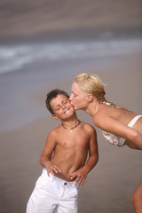 Fototapeta premium Happy Mother and son on the beach