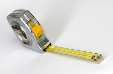old measuring tool on a white background