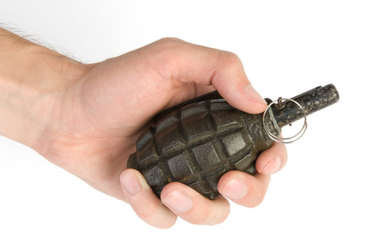 old hand grenade in a man's hand