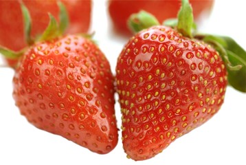 Ripe red strawberry on White