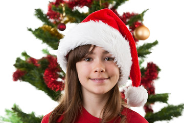Girl wearing Santa Claus hat isolated on white