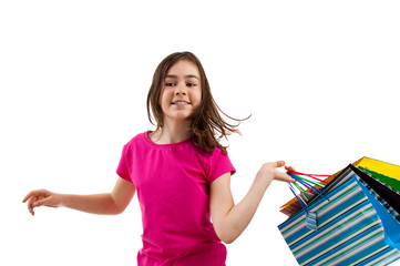 Girl holding shopping bags isolated on white background