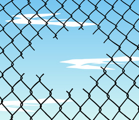 Cut wire fence with blue sky background