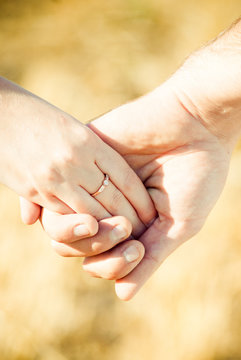 Holding Hands With Wedding Ring, Close-up