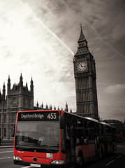 Famous landmark "Big Ben" with red bus in London, UK