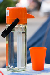 water flagon or bottle and cup