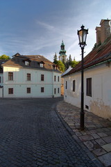 Fototapeta na wymiar Early morning sunlight on old town of Banska Stiavnica, Slovakia