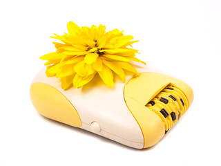 Epilator and yellow flower