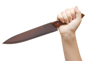 Hand holding a knife isolated on white
