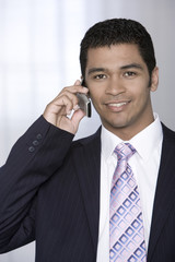 Portrait of businessman on phone.