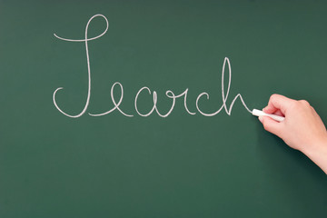 Search written on a blackboard