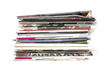 stack of newspapers and magazines