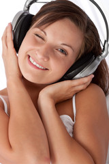 Fototapeta premium Young woman with headphones