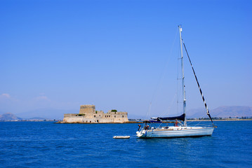 Sailboat sailing in the morning with blue sky