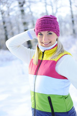 Frozen beautiful woman in winter clothing outdoors ....