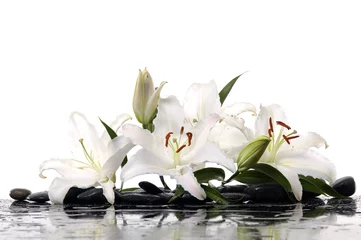 Wandaufkleber Madonna lilies with spa stone with reflection © Mee Ting