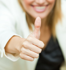 Businesswoman with her thumbs up