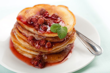 sweet pancakes with strawberry jam