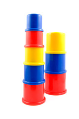 Stacked toys over white background