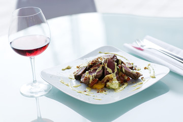 steak fillet with grilled vegetables and red wine