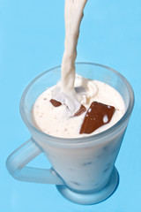 pouring milk with chocolate