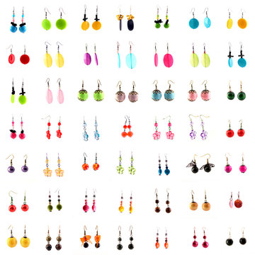 collection of ear rings on white background