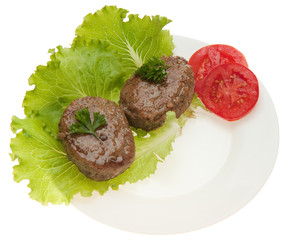Cutlets with vegetables on a plate