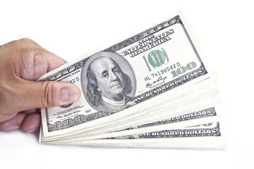 Hand Holding Dollar Stack