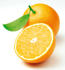 Two freshly cut oranges with a leaf