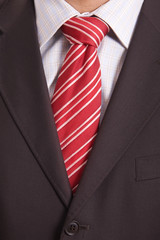 Detail of a Business man Suit with red tie