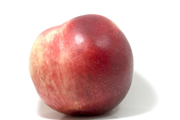 single peach in close up