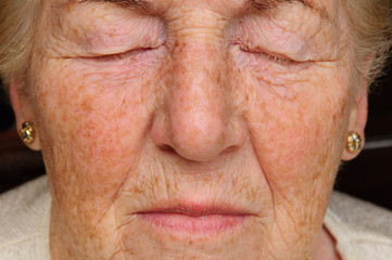 Senior woman with eyes closed