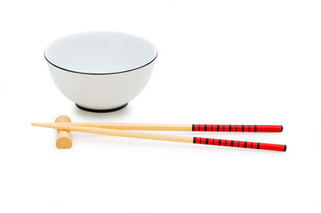 Bowl and chopsticks isolated on the white