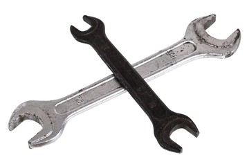 Two crossed spanners isolated on white background
