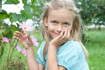 young girl with a flower
