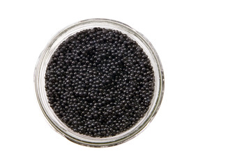 Glass jar of delicious back caviar. Isolated on white