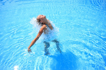 woman enjoying a swimming pool