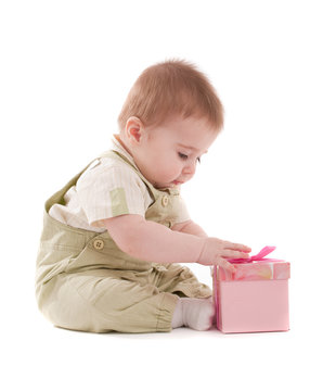 Baby boy open small pink gift box