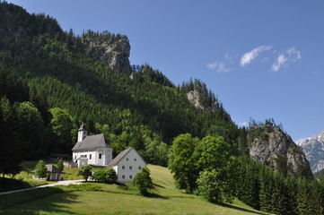 Fototapeta na wymiar Beautiful alpine scenery with white church